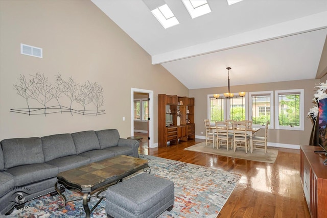 1233 Prairie Ln, Lemont, IL 60439 - living area featuring a chandelier, baseboards, wood finished floors, high vaulted ceiling, and beamed ceiling