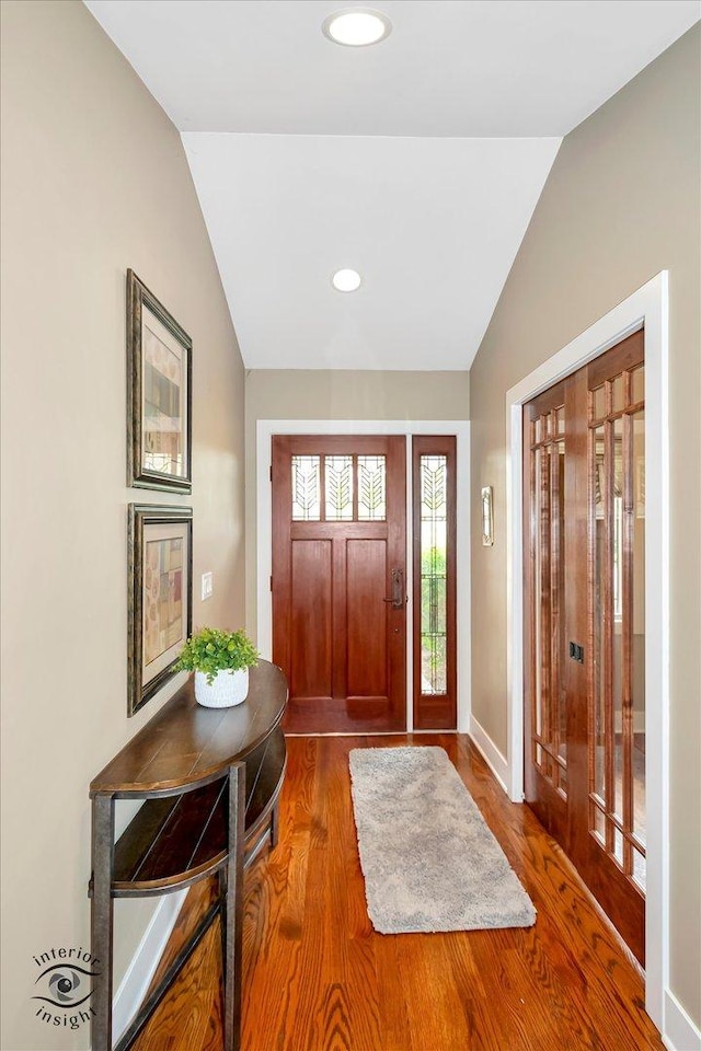 1233 Prairie Ln, Lemont, IL 60439 - foyer featuring lofted ceiling, wood finished floors, baseboards, and recessed lighting
