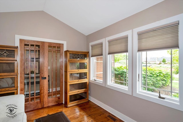 1233 Prairie Ln, Lemont, IL 60439 - living area with vaulted ceiling, wood finished floors, and baseboards