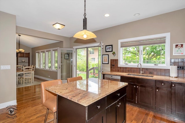1233 Prairie Ln, Lemont, IL 60439 - kitchen with a sink, decorative backsplash, light wood finished floors, light stone countertops, and recessed lighting