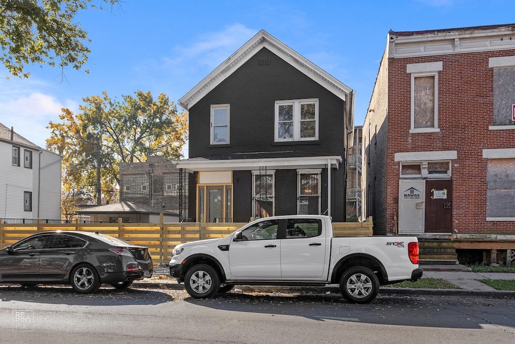 3455 W Walnut St, Chicago, IL 60624 - view of front of house featuring brick siding and entry steps