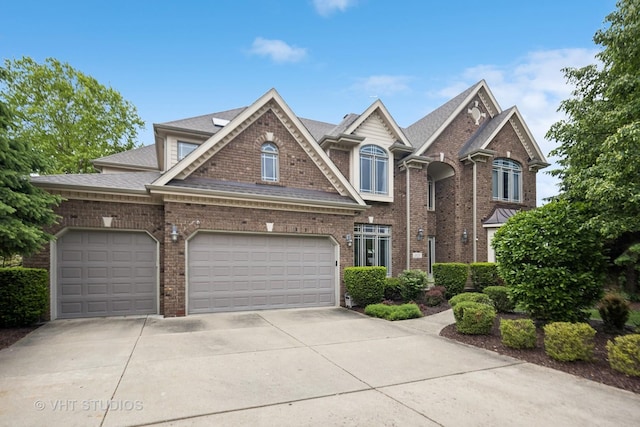 3620 Schillinger Ct, Naperville, IL 60564 - view of front of home featuring concrete driveway, a garage, roof with shingles, and brick siding
