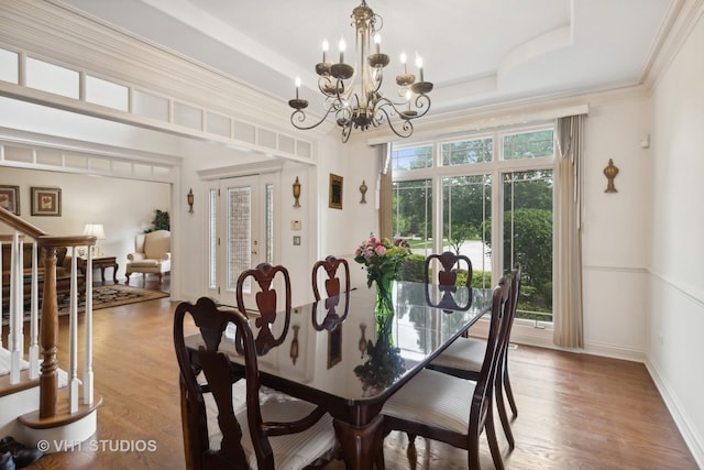 3620 Schillinger Ct, Naperville, IL 60564 - dining space with wood finished floors, a chandelier, stairway, and a raised ceiling