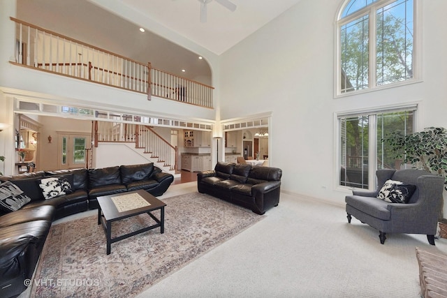 3620 Schillinger Ct, Naperville, IL 60564 - living area featuring high vaulted ceiling, a ceiling fan, stairs, carpet floors, and baseboards