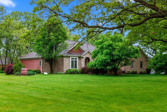 10920 Preservation Way, Richmond, IL 60071 - view of front of home with brick siding and a front lawn