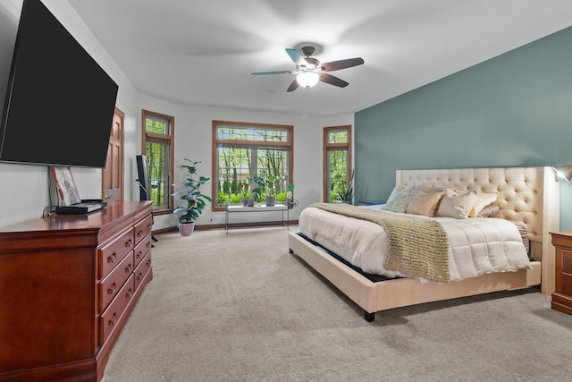 10920 Preservation Way, Richmond, IL 60071 - bedroom featuring light colored carpet, multiple windows, baseboards, and a ceiling fan
