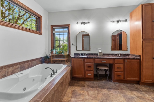 10920 Preservation Way, Richmond, IL 60071 - full bath with a tub with jets, double vanity, and stone finish flooring