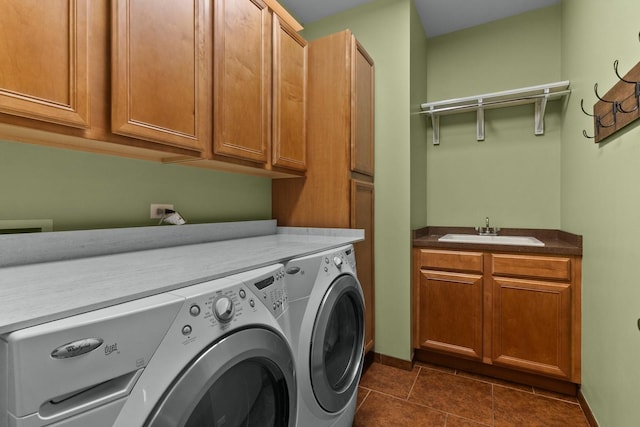10920 Preservation Way, Richmond, IL 60071 - laundry area with cabinet space, washer and clothes dryer, baseboards, and dark tile patterned flooring
