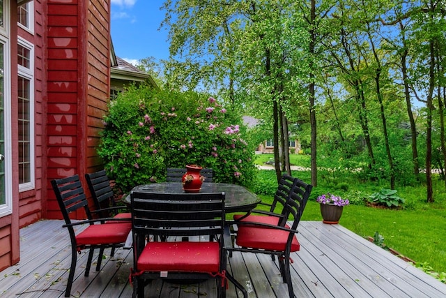 10920 Preservation Way, Richmond, IL 60071 - wooden terrace with outdoor dining space and a lawn