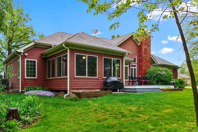 10920 Preservation Way, Richmond, IL 60071 - back of house with a chimney, a yard, a deck, and roof with shingles