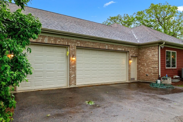 10920 Preservation Way, Richmond, IL 60071 - garage with asphalt driveway