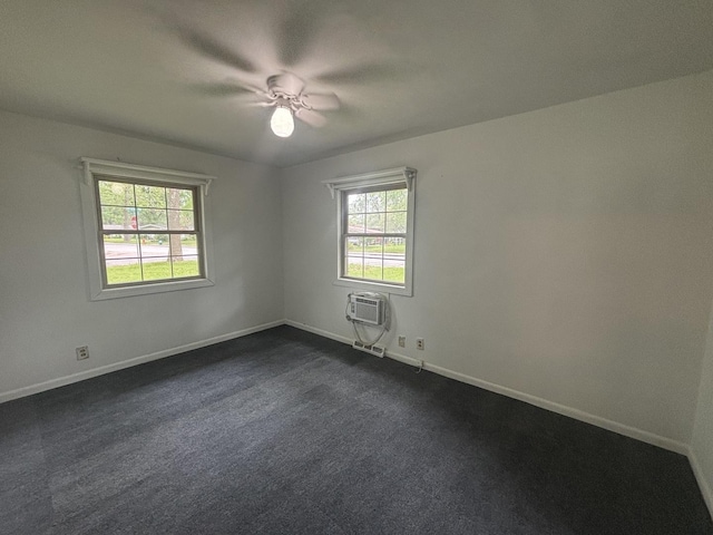 85 Circle Dr E, Montgomery, IL 60538 - unfurnished room featuring baseboards, a wall unit AC, and a ceiling fan