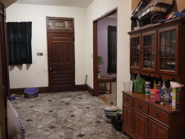 312 S Monroe St, Streator, IL 61364 - entrance foyer featuring baseboards