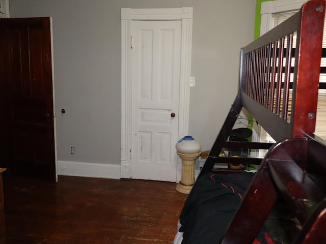 312 S Monroe St, Streator, IL 61364 - bedroom featuring wood finished floors and baseboards