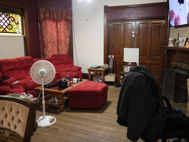 312 S Monroe St, Streator, IL 61364 - living room with light wood-style floors and a fireplace