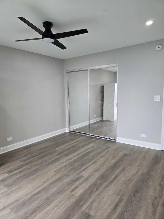 177 E Fullerton Ave, Glendale Heights, IL 60139 - unfurnished bedroom with wood finished floors, a closet, baseboards, recessed lighting, and ceiling fan