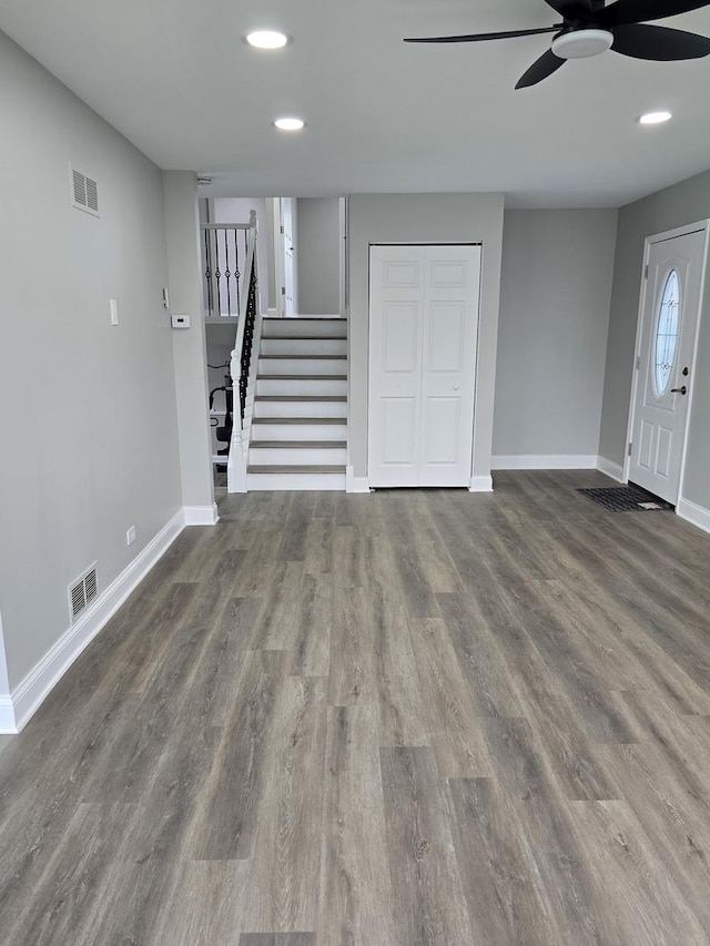 177 E Fullerton Ave, Glendale Heights, IL 60139 - unfurnished living room with ceiling fan, baseboards, stairway, recessed lighting, and wood finished floors