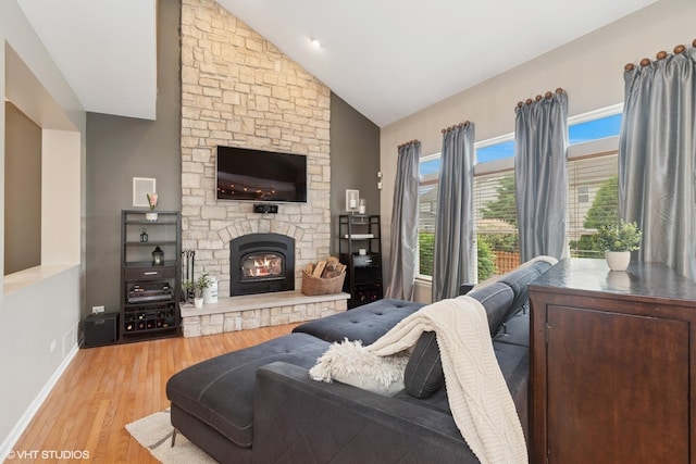 31730 N Clearwater Dr, Lakemoor, IL 60051 - living room with a fireplace, light wood-style flooring, baseboards, and high vaulted ceiling