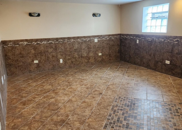 526 Marquette Ave, Calumet City, IL 60409 - unfurnished room featuring a wainscoted wall and tile walls