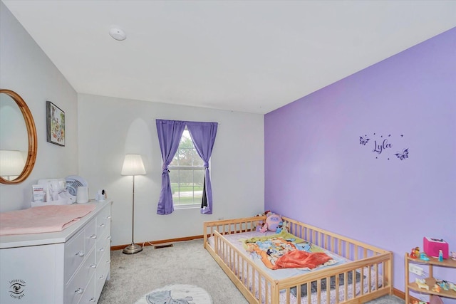 15255 Kenmare Cir, Manhattan, IL 60442 - bedroom with light colored carpet and a nursery area