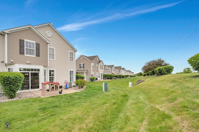 15255 Kenmare Cir, Manhattan, IL 60442 - view of grassy yard with a patio and a residential view