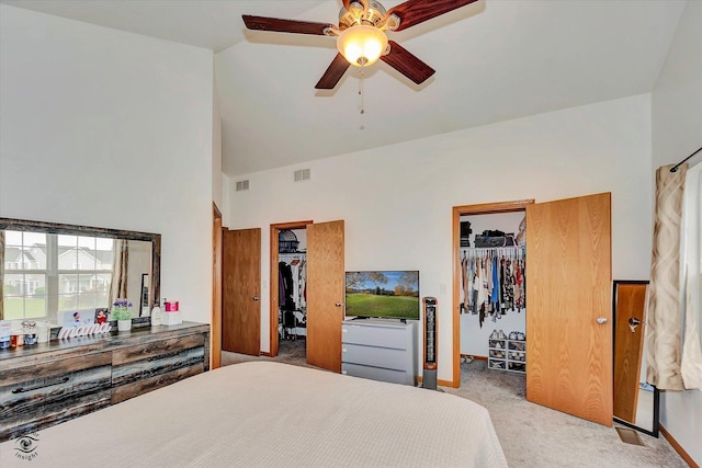 15255 Kenmare Cir, Manhattan, IL 60442 - bedroom with a spacious closet, carpet flooring, high vaulted ceiling, a ceiling fan, and a closet