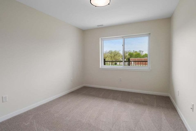 2034 W 75th Pl Unit 36, Merrillville, IN 46410 - carpeted empty room with baseboards