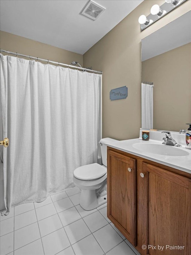 3208 Raphael Ct, Saint Charles, IL 60175 - full bath featuring toilet, vanity, and tile patterned flooring