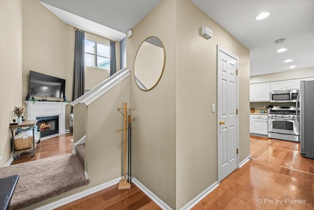 3208 Raphael Ct, Saint Charles, IL 60175 - hallway featuring light wood finished floors, baseboards, and recessed lighting