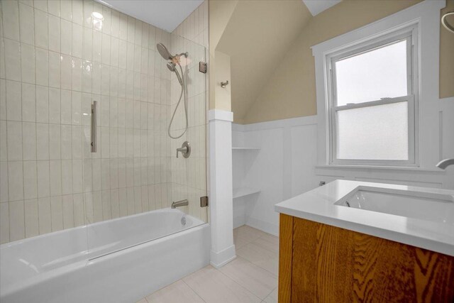 6014 W Fletcher St, Chicago, IL 60634 - full bath featuring tile patterned flooring, vanity, shower / washtub combination, and wainscoting