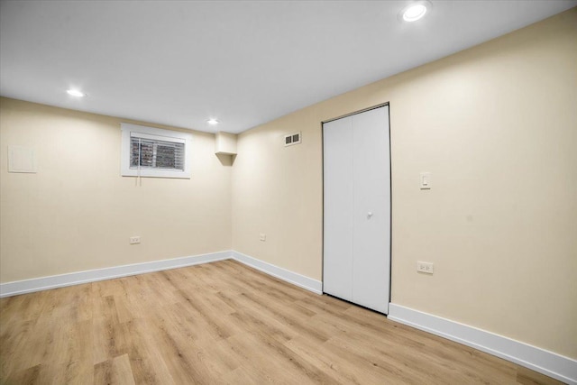 6014 W Fletcher St, Chicago, IL 60634 - finished below grade area with recessed lighting, light wood-style flooring, and baseboards