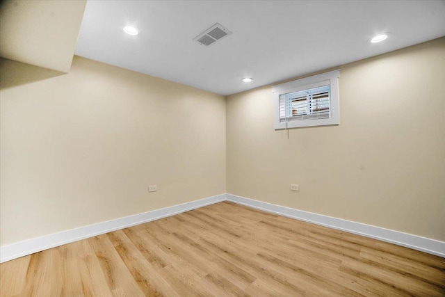 6014 W Fletcher St, Chicago, IL 60634 - below grade area featuring light wood-type flooring, baseboards, and recessed lighting