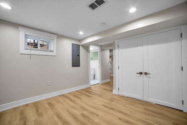 6014 W Fletcher St, Chicago, IL 60634 - basement with electric panel, baseboards, light wood-style flooring, and recessed lighting