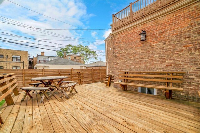6014 W Fletcher St, Chicago, IL 60634 - wooden deck featuring outdoor dining space