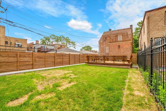 6014 W Fletcher St, Chicago, IL 60634 - view of yard with a deck
