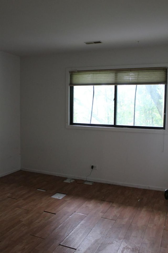 2364 S St Unit C, Elgin, IL 60123 - empty room with wood finished floors and baseboards