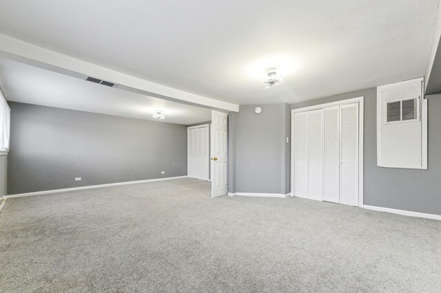 11423 S Calumet Ave, Chicago, IL 60628 - unfurnished bedroom featuring carpet, baseboards, and a closet