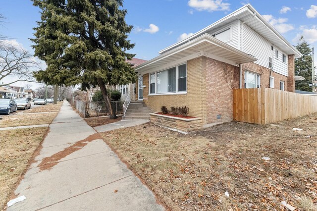 11423 S Calumet Ave, Chicago, IL 60628 - view of front of property with brick siding