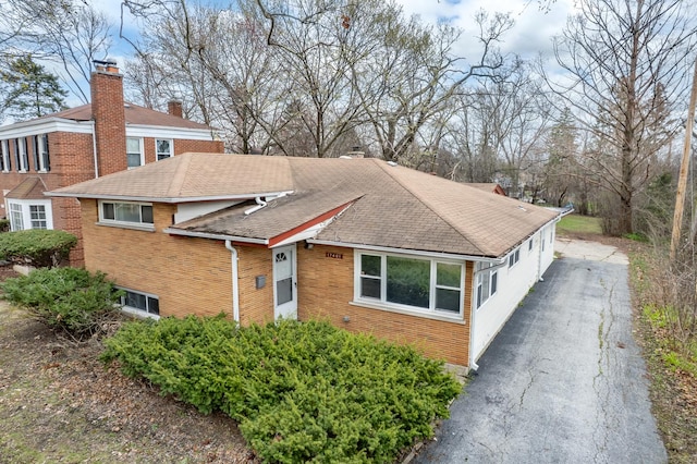 17401 Holmes Ave, Hazel Crest, IL 60429 - view of front facade featuring a shingled roof and brick siding