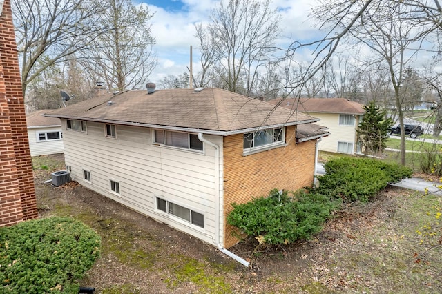 17401 Holmes Ave, Hazel Crest, IL 60429 - view of property exterior with roof with shingles, central AC, and brick siding
