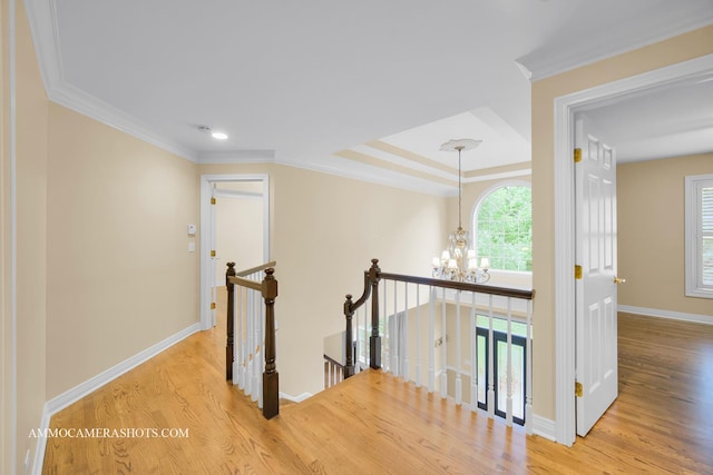792 Black Walnut Dr, Sugar Grove, IL 60554 - hallway with an upstairs landing, wood finished floors, a chandelier, and crown molding