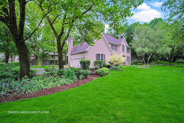 792 Black Walnut Dr, Sugar Grove, IL 60554 - view of property exterior with a chimney, an attached garage, and brick siding