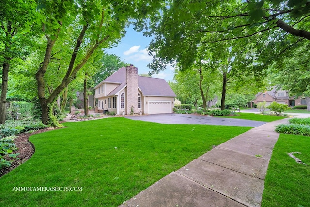792 Black Walnut Dr, Sugar Grove, IL 60554 - view of front of property with asphalt driveway, a chimney, a garage, and a front lawn