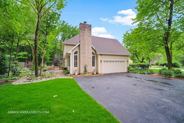 792 Black Walnut Dr, Sugar Grove, IL 60554 - view of front of home with driveway, a chimney, a garage, and a front lawn