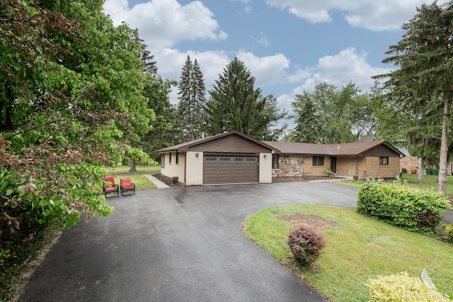 14940 Wilco Dr, Homer Glen, IL 60491 - ranch-style house featuring a garage, a front yard, and asphalt driveway