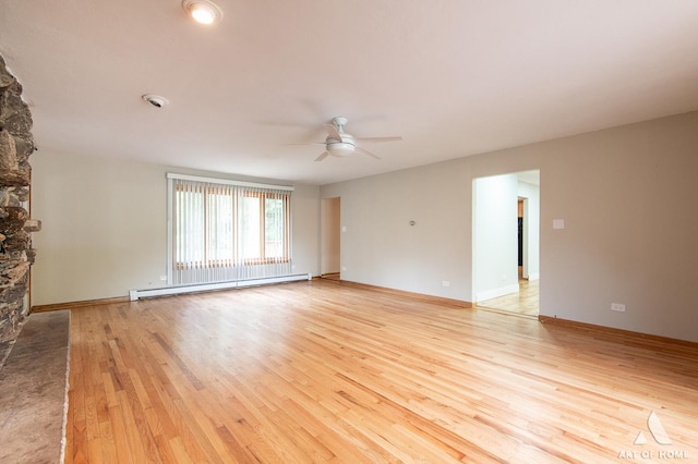 14940 Wilco Dr, Homer Glen, IL 60491 - unfurnished living room with a baseboard radiator, ceiling fan, light wood-style floors, and baseboards