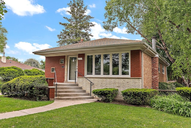 9017 S 50th Ave, Oak Lawn, IL 60453 - view of front of home with a front lawn and brick siding