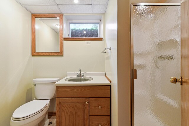 9017 S 50th Ave, Oak Lawn, IL 60453 - bathroom featuring a shower stall, vanity, toilet, and a paneled ceiling