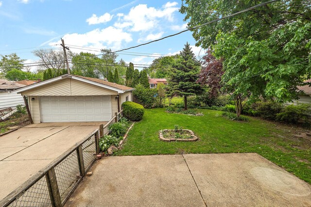 9017 S 50th Ave, Oak Lawn, IL 60453 - view of yard with a garage