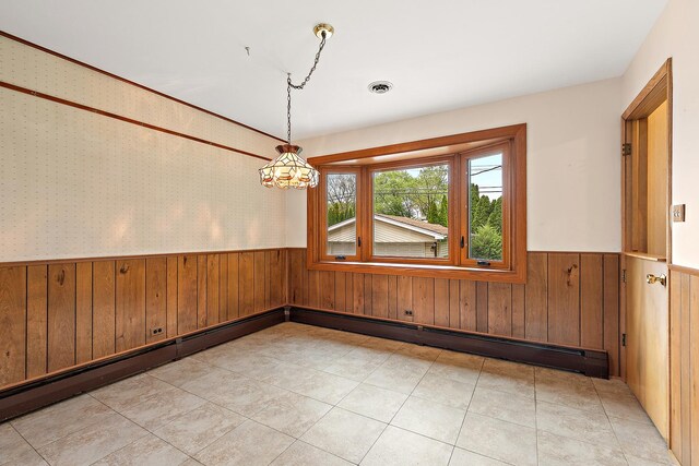 9017 S 50th Ave, Oak Lawn, IL 60453 - unfurnished room featuring a wainscoted wall, wooden walls, and a chandelier